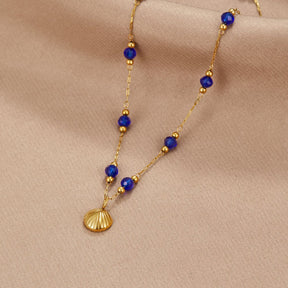 Colar Feminino Dourado Nerissa de Concha Dourada e miçanga Azul